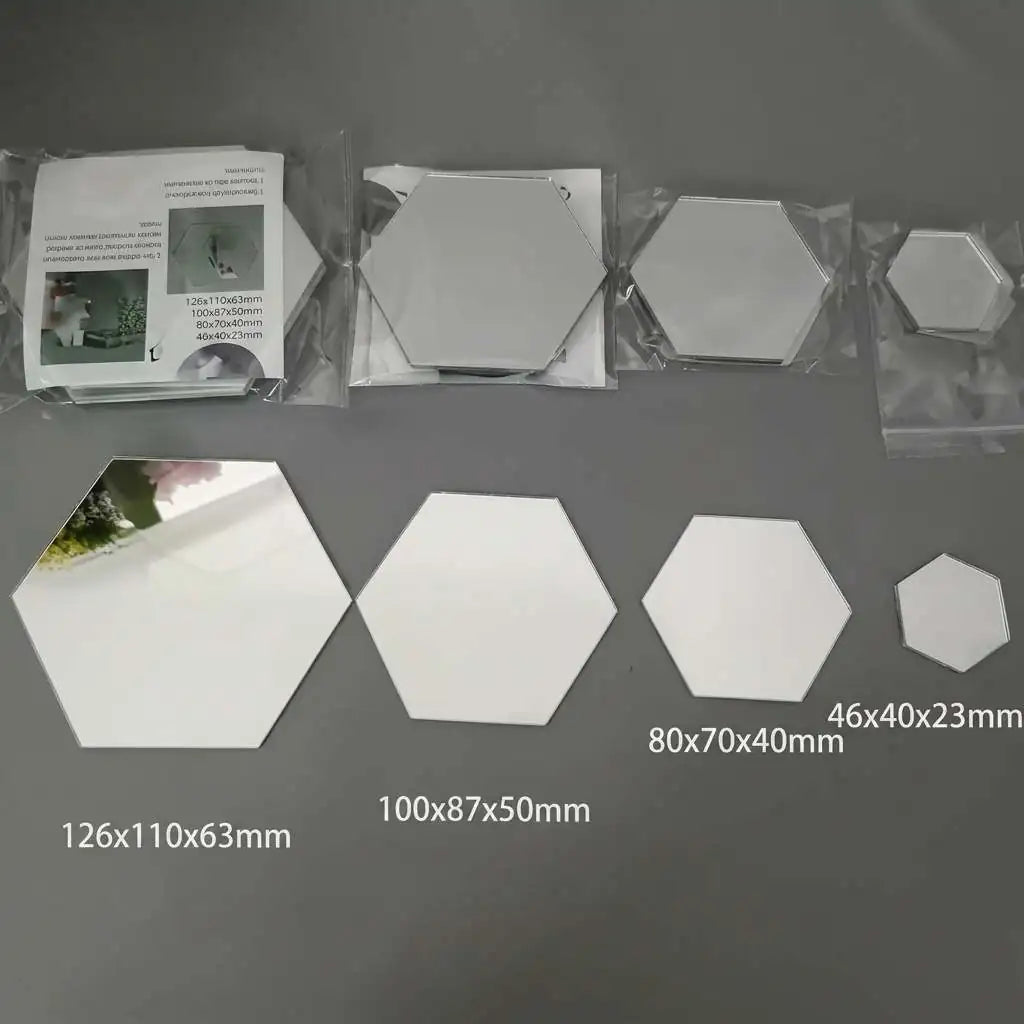 Pack contents with hexagon mirror tiles and adhesive pads